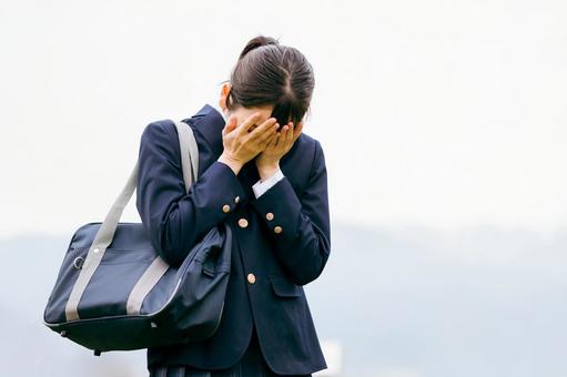 落ち込む高校生